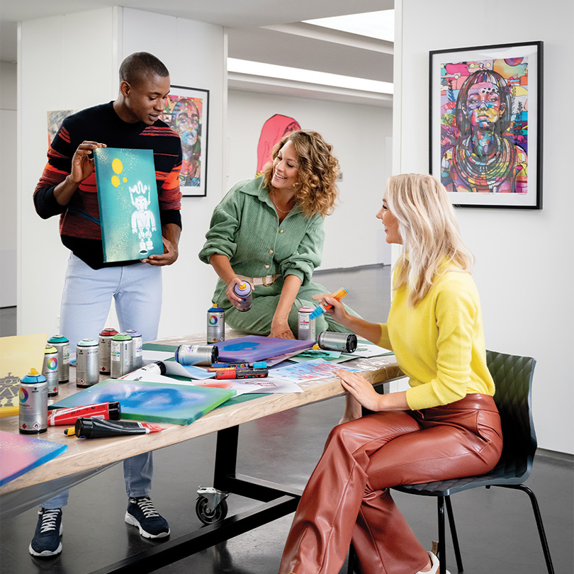 Group in art work shop in art gallery